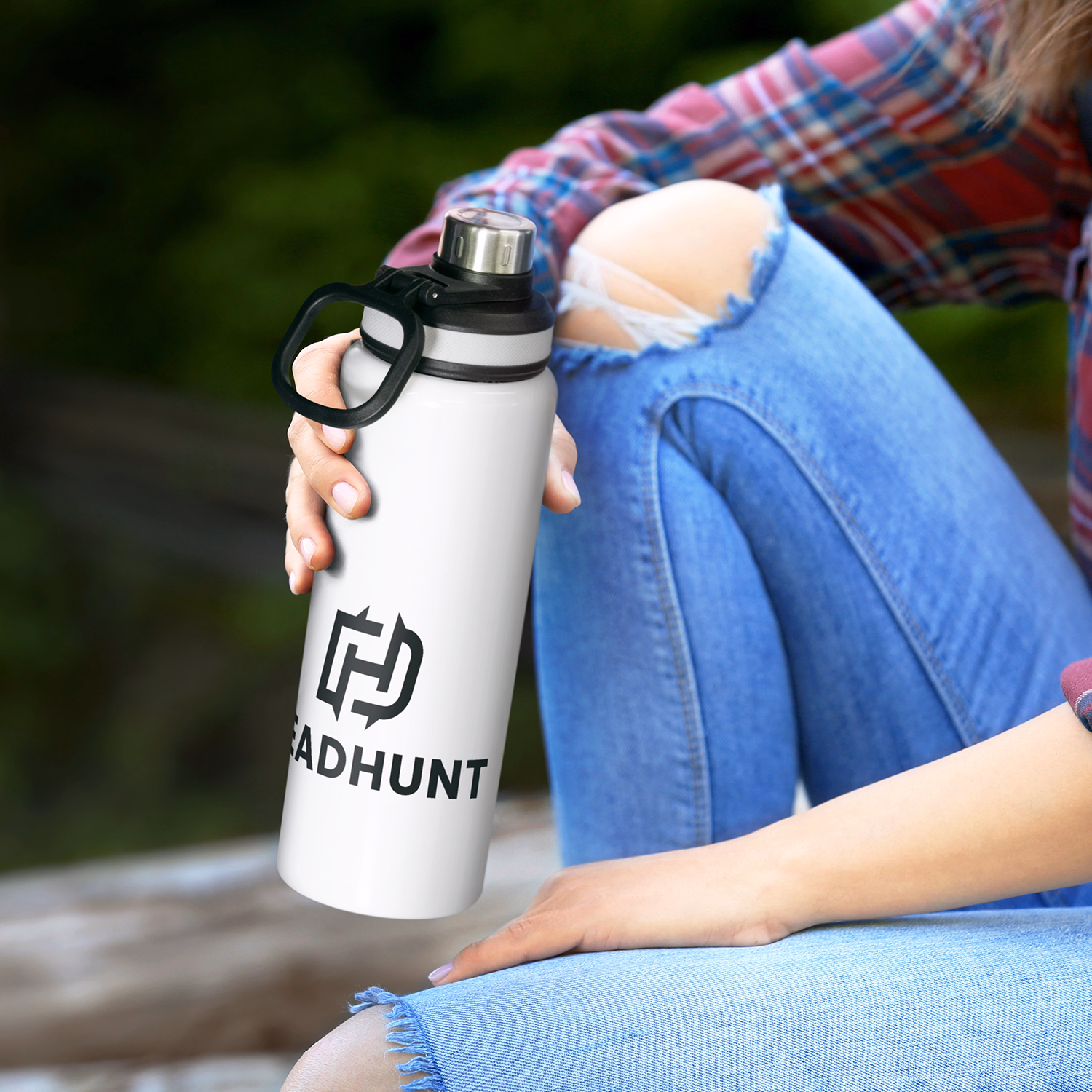 Person holding Solana bottle