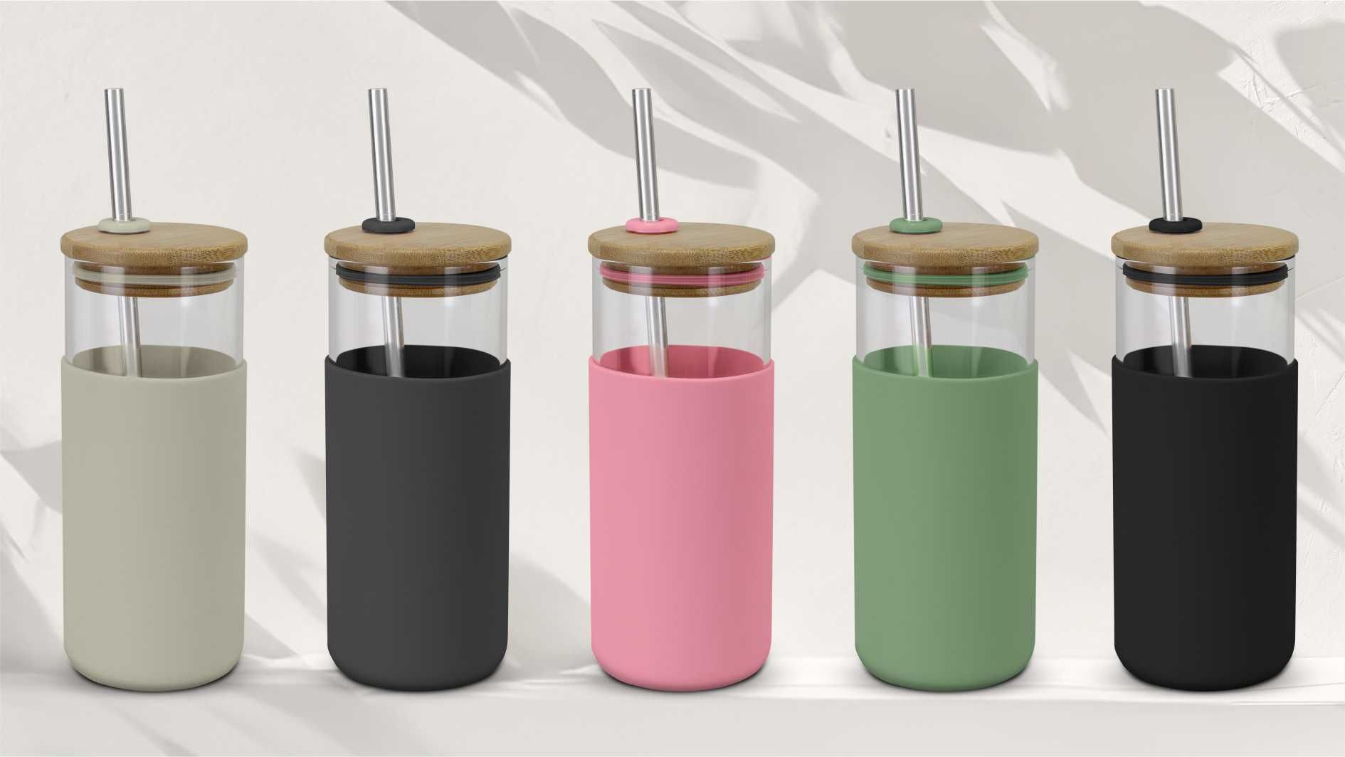 Five reusable glass drink tumblers with bamboo lids and colourful silicone sleeves.